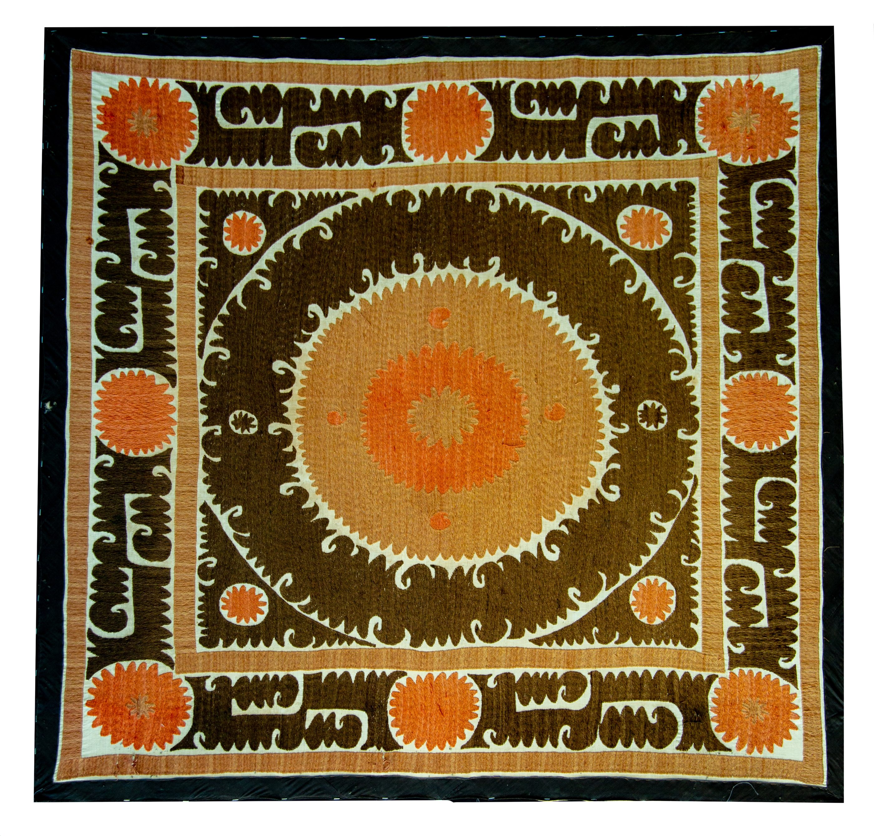 Brown concentric medallion — palak, Attribution pending
